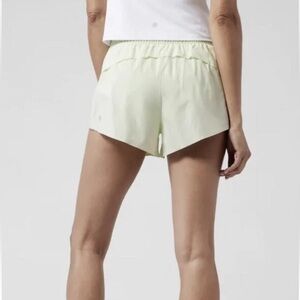 Athleta Hustle 3" Shorts Light Mint Green Zip Pocket Womens Size Small.